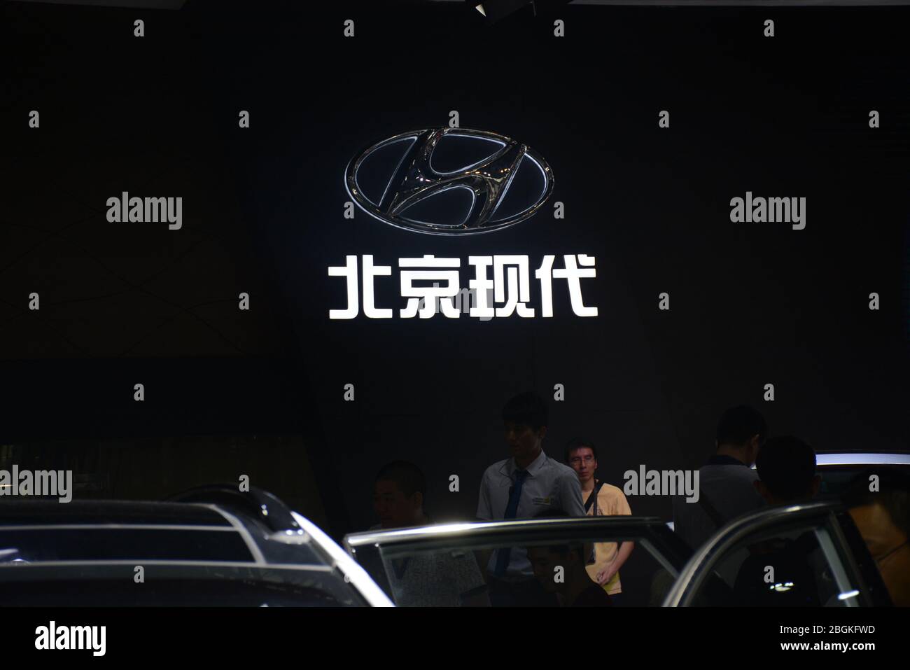 --FILE--The logo and a model of Beijing Hyundai Motor, an automobile ...