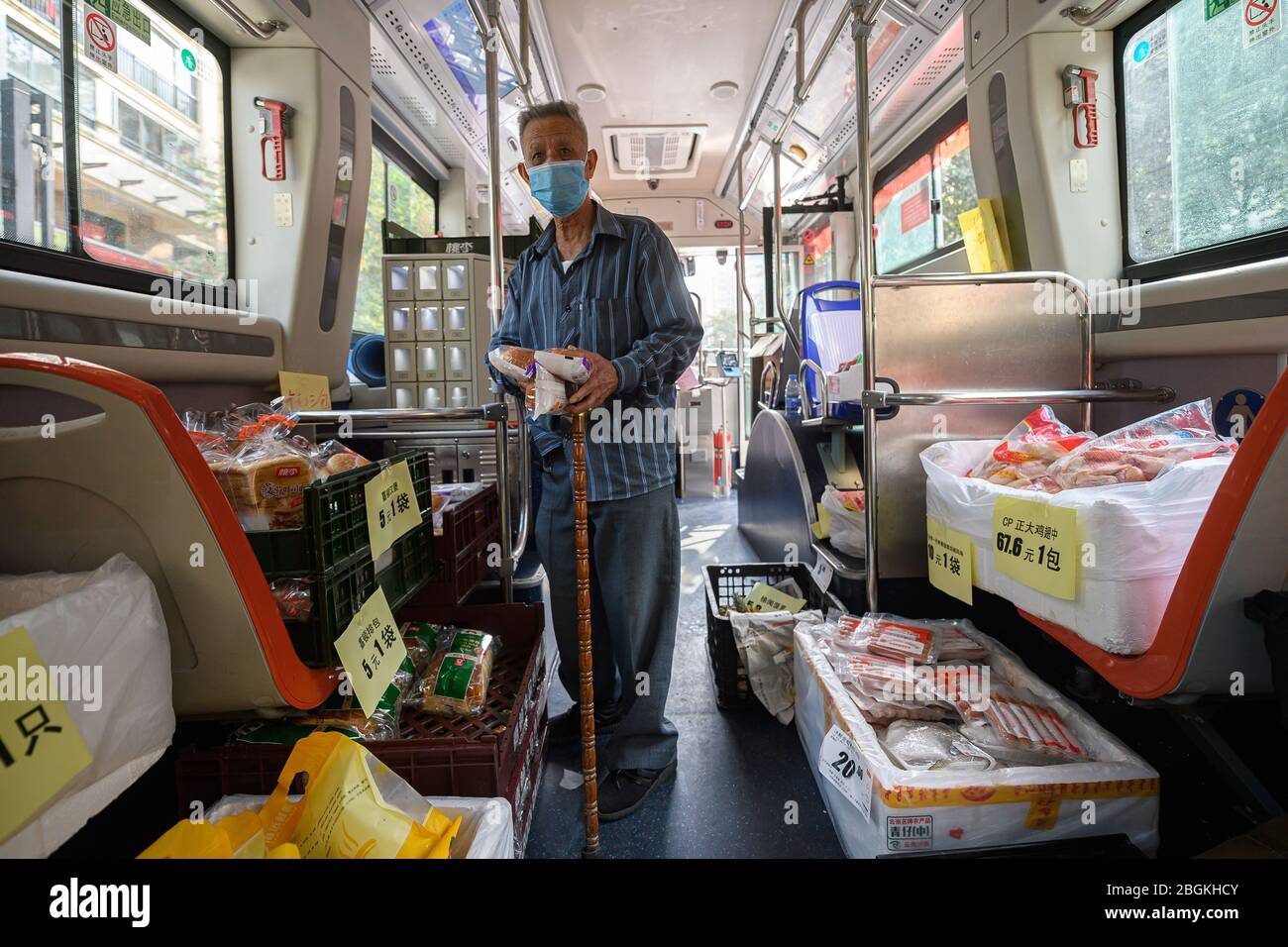 Residents purchase at the bus supermarket, which is a cooperation of local bus service and supermarket for citizens' convenience, Guangzhou city, sout Stock Photo