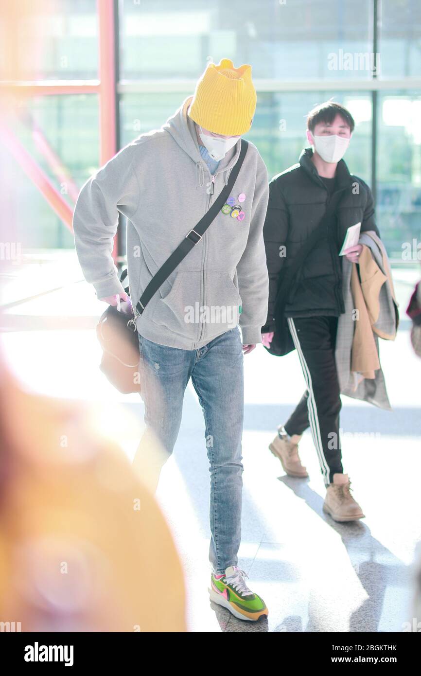 Chen Youwei of Chinese boy band UNINE arrives at a Beijing airport before  departure in Beijing, China, 17 March 2020. Sneakers: Nike x Sacai Stock  Photo - Alamy