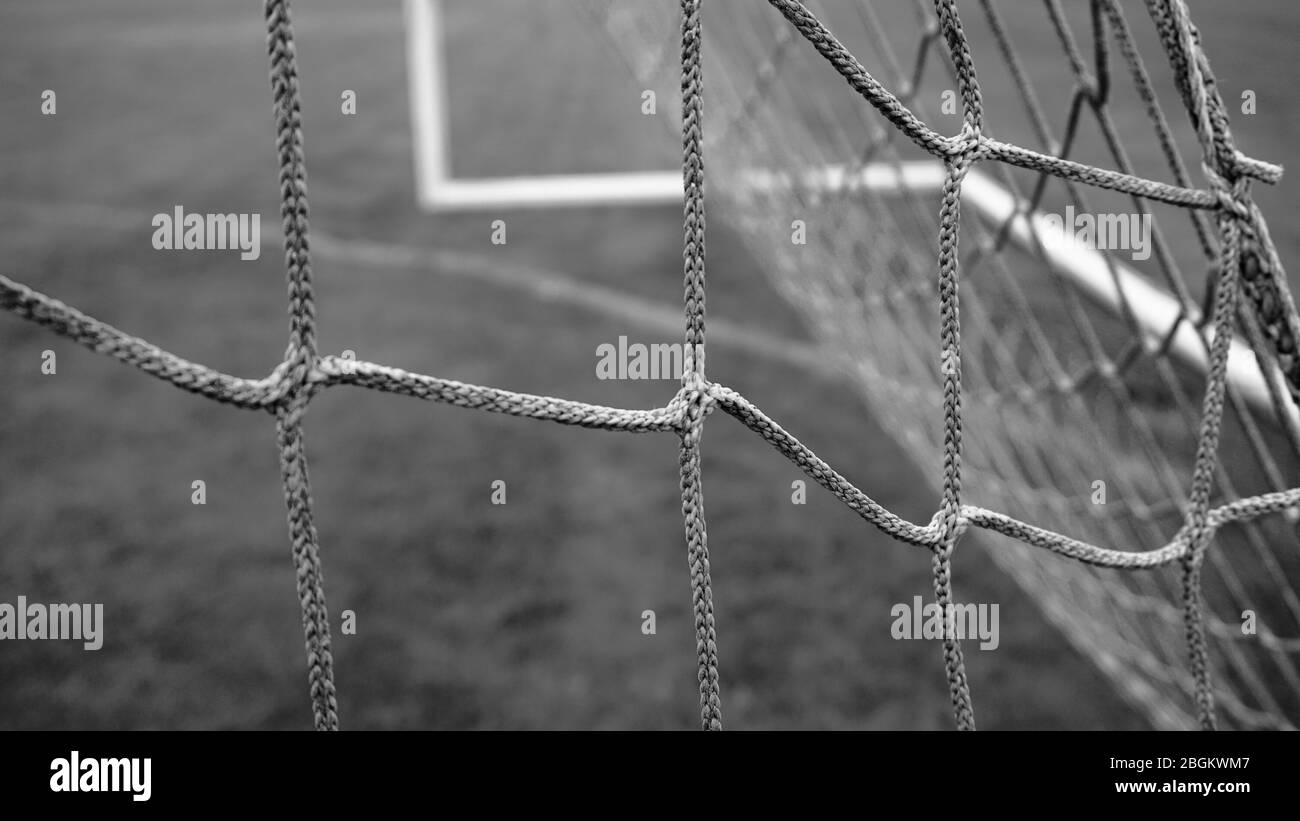 Black and white close up of a soccer net or soccer goal, twine mesh pattern. Stock Photo