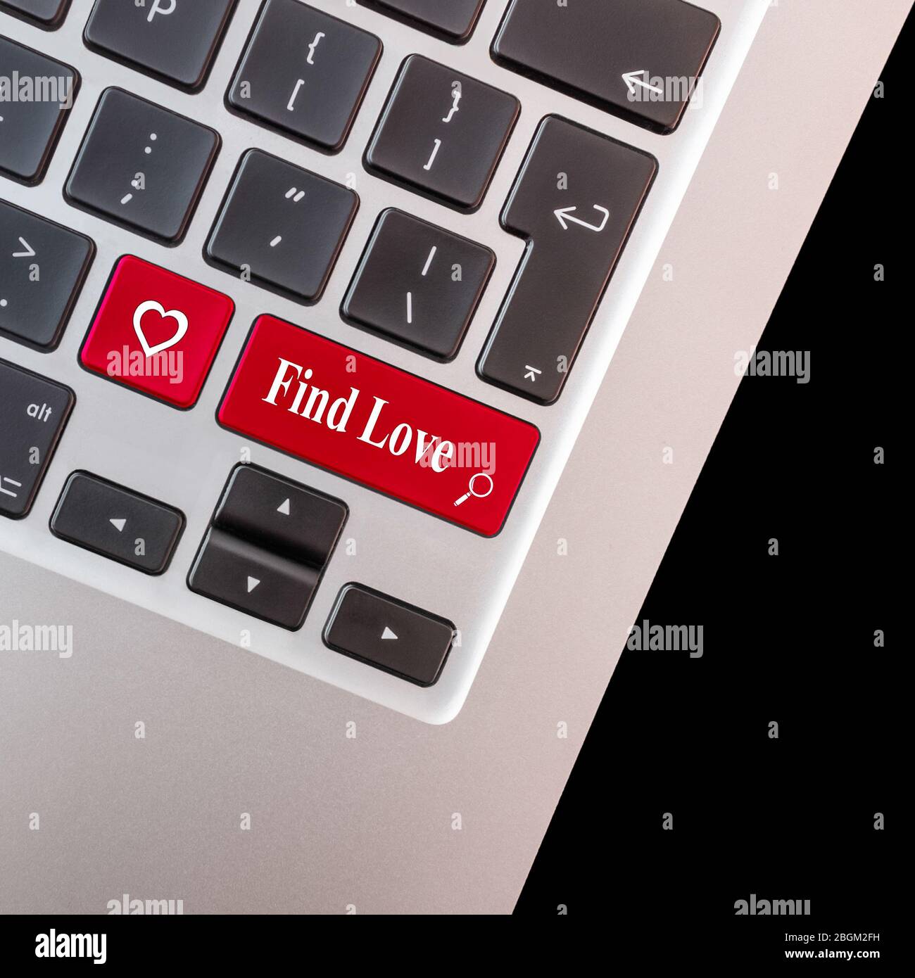 Computer key with love shape and the words find love. Stock Photo