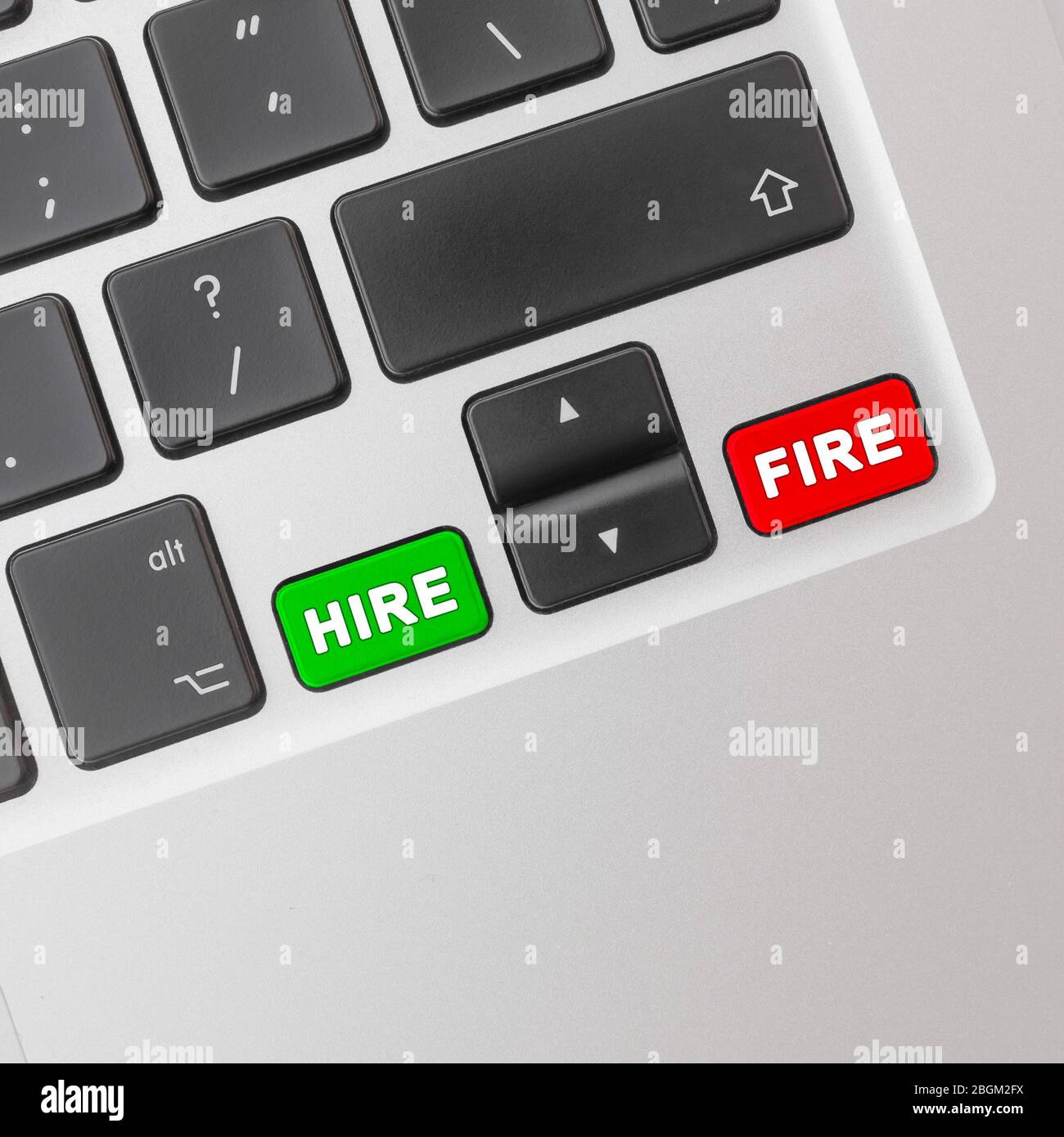 HIRE and FIRE buttons on computer keyboard. Stock Photo