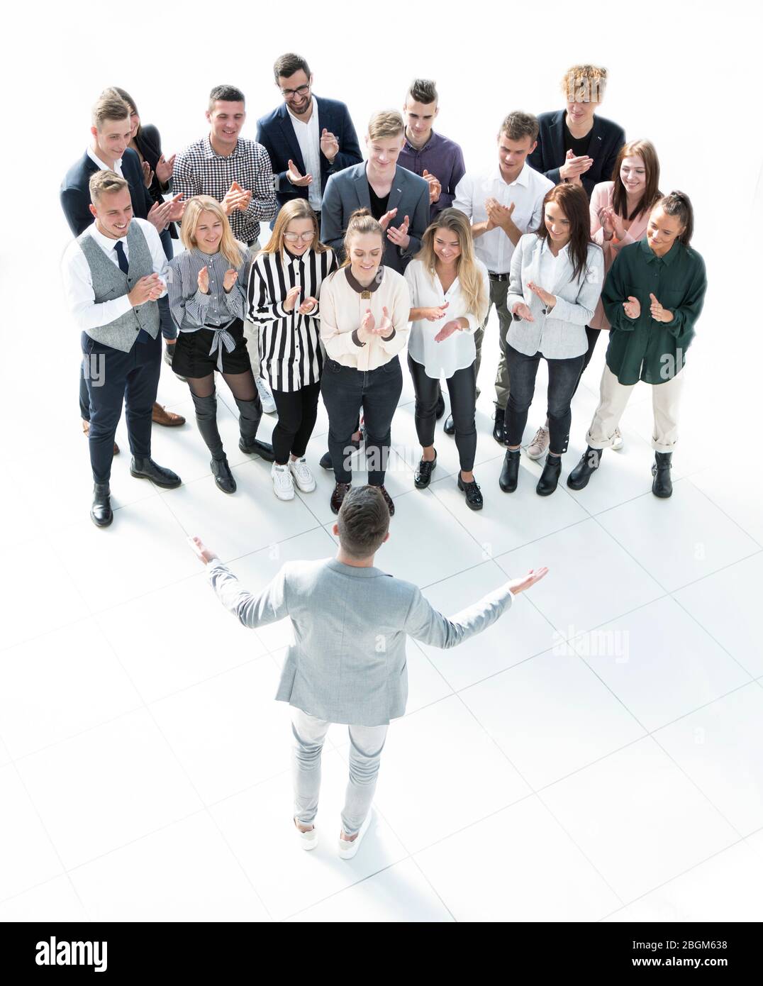 Leader High View top view. young leader standing at the front of the business team Stock ...