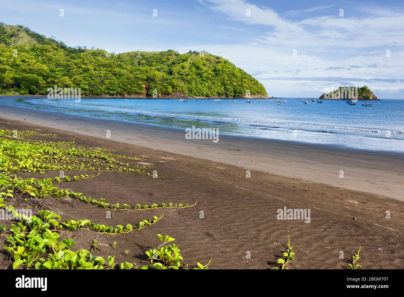 View of a volcanic beach on the pacific coast of central America. Playas del Coco, Costa Rica. Guanacaste province. Stock Photo