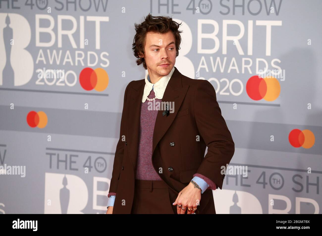 Harry Styles attends The BRIT Awards 2020 at The O2 Arena on February 18, 2020 in London, England. Stock Photo
