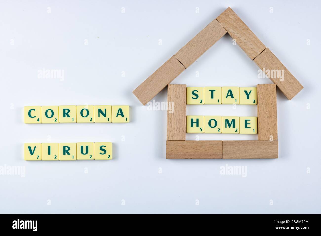 writing with word game letters 'Stay Home' for be safe to corona virus Stock Photo