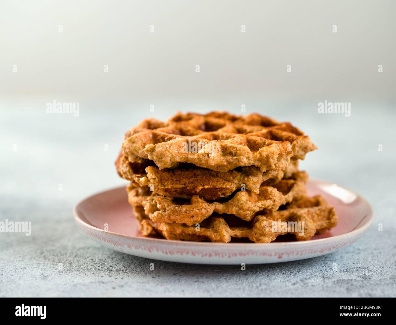 Easy healthy gluten free oat waffles with copy space. Stack of