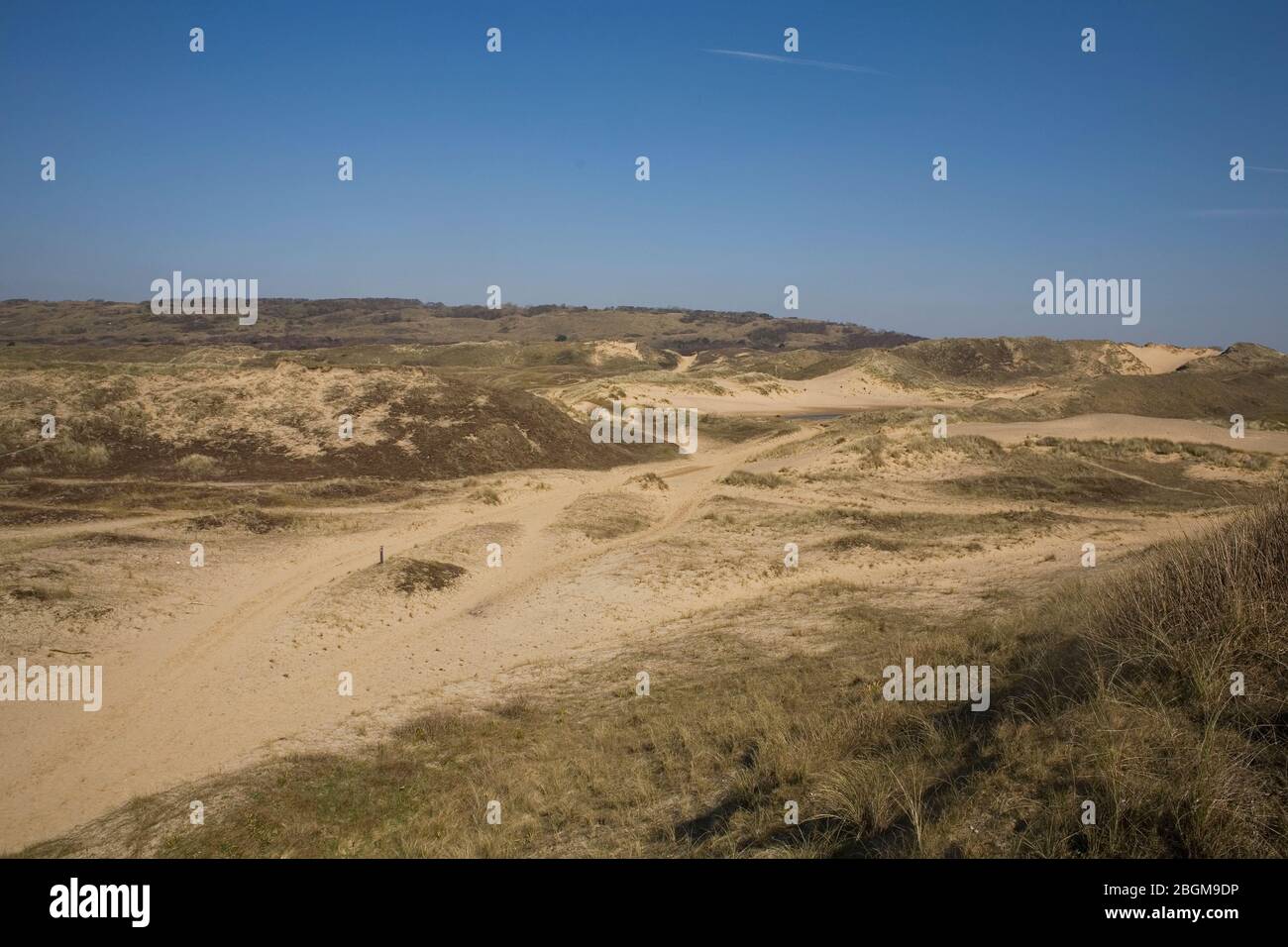 wide view of sandy path and bridleway in heart of dunes at Merthry Mawr National nature reserve Stock Photo