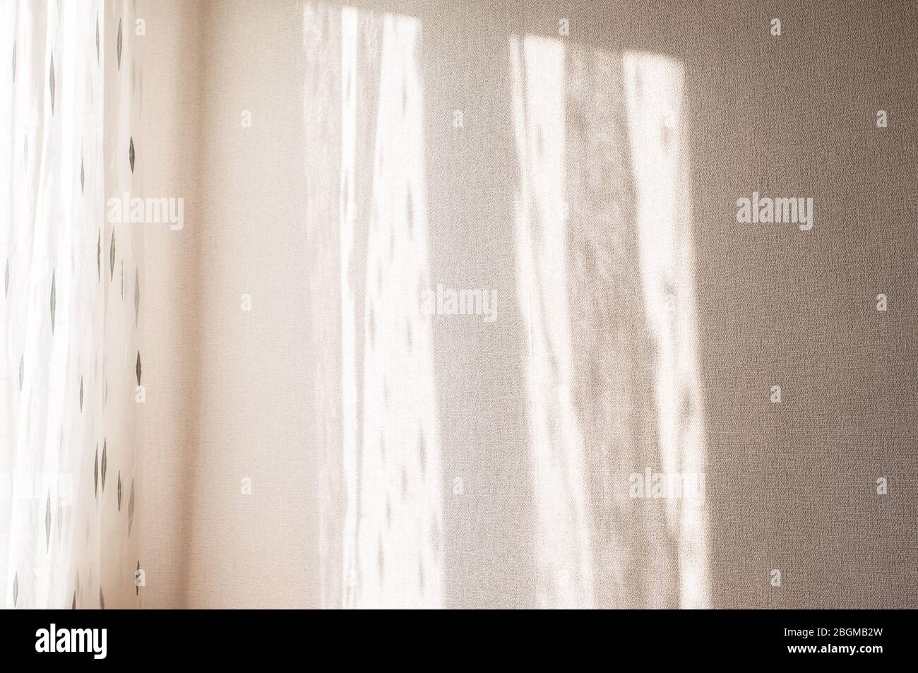 Abstract shiny shadow on the wall in room. Stock Photo