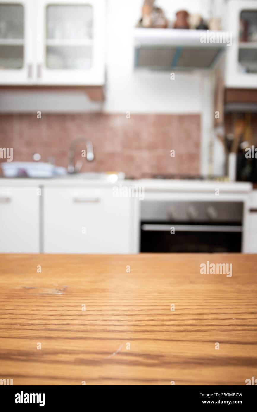 Wood Table Top On Blurred Kitchen Room Background Stock Photo Alamy