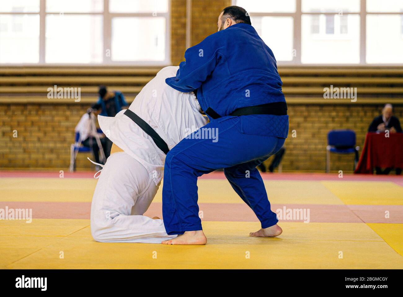 men judokas heavyweight fight in judo competition Stock Photo Alamy