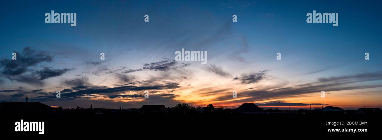 Sunset panorama with clouds high resolution Stock Photo