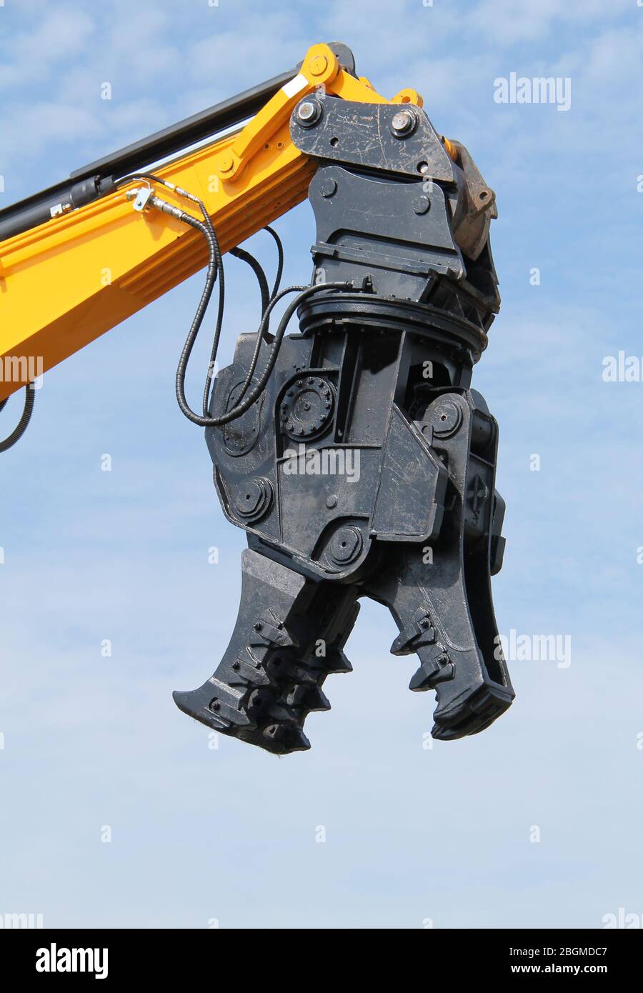 A Hydraulic Rotating Pulveriser Attachment for Demolition. Stock Photo
