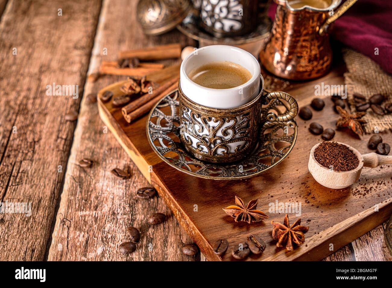 Traditional turkish coffee cup and roasted coffee beans Stock Photo