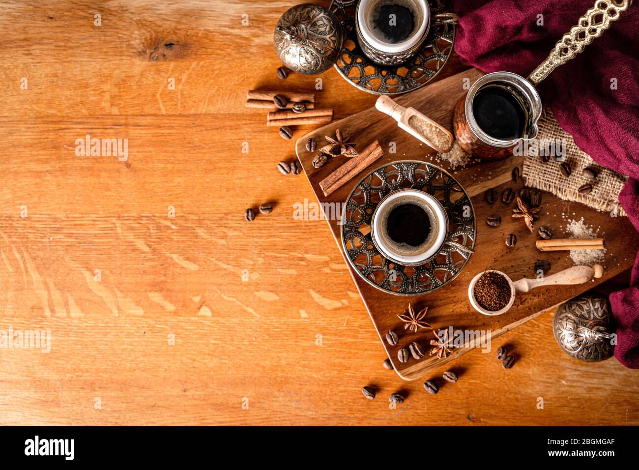 Top down view of a coffee table arrangement on wood background with space for text Stock Photo