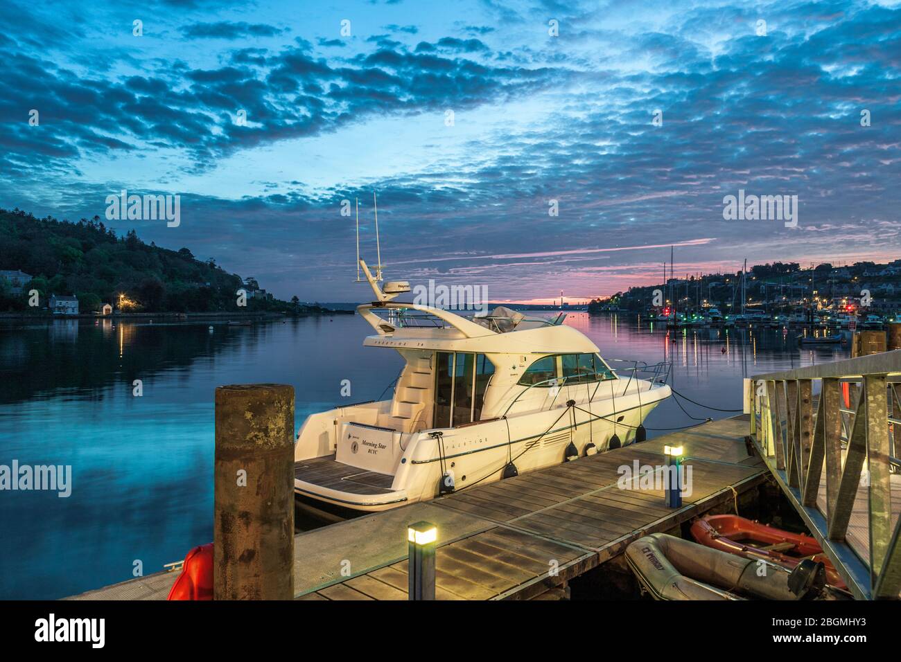 Crosshaven, Cork, Ireland. 22nd April, 2020. Motor boat Morning Star berthed at the Hugh Coveney Pier before dawn at the picturesque village of Crosshaven, Co. Cork, Ireland. - Credit; David Creedon / Alamy Live News Stock Photo