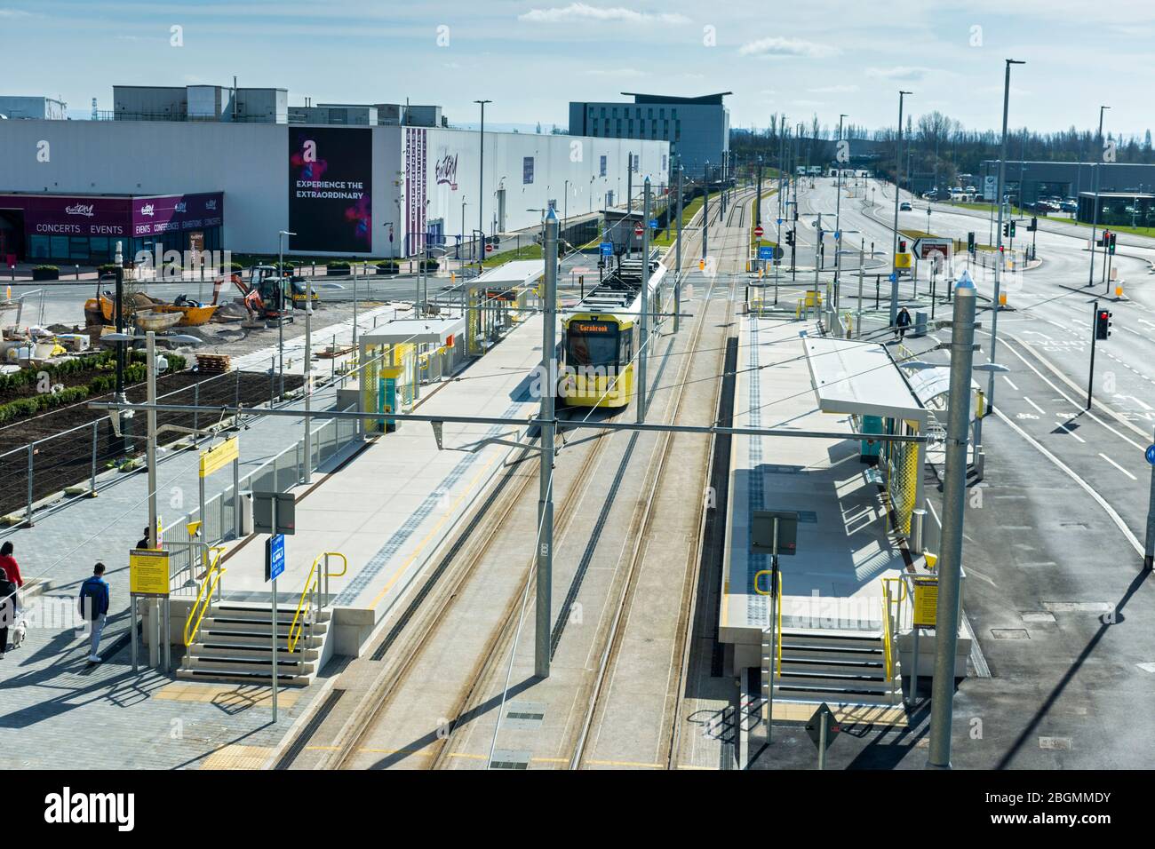Metrolink tram at the Barton Dock Road stop on the opening day of the Trafford Park Line, 22 March 2020.  Trafford, Manchester, UK. Stock Photo