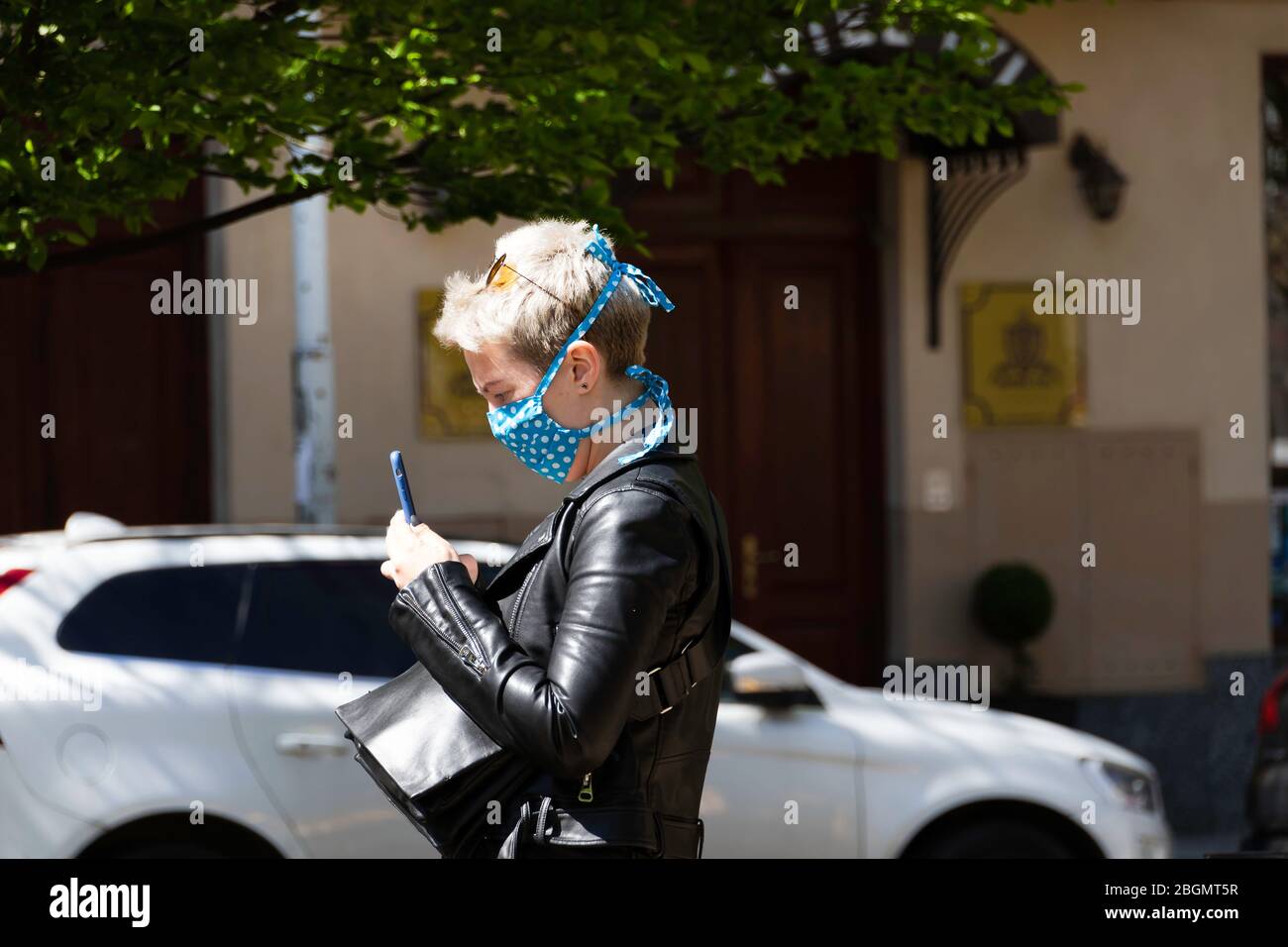 Woman wearing leather mask hi-res stock photography and images - Alamy