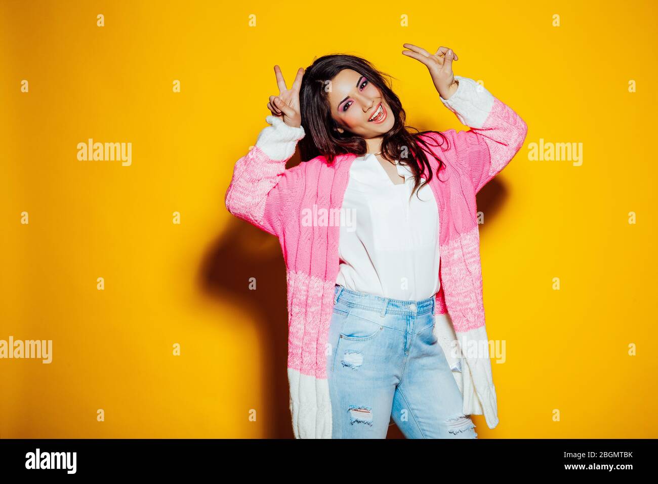 girl model shows symbols with their hands Stock Photo - Alamy