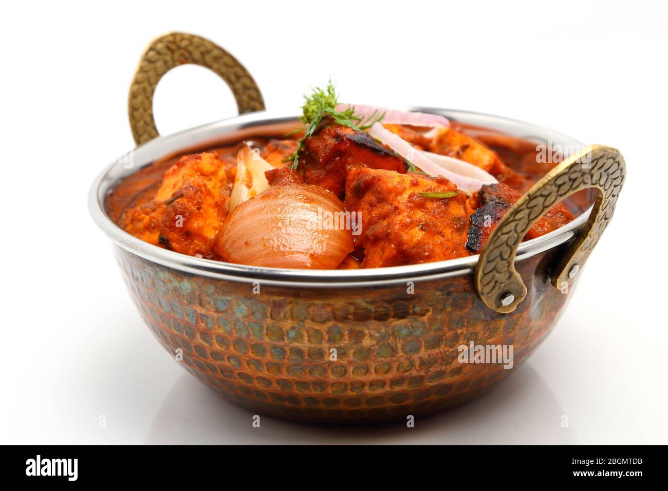 Indian Food or Indian Curry in a copper brass serving bowl Stock Photo -  Alamy