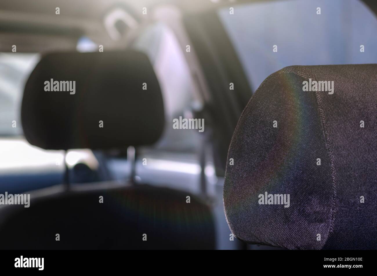 Car interior without people. Empty seats of a modern car. Shooting from the  rear seat in the direction of the windshield. Travel by car. Selective foc  Stock Photo - Alamy