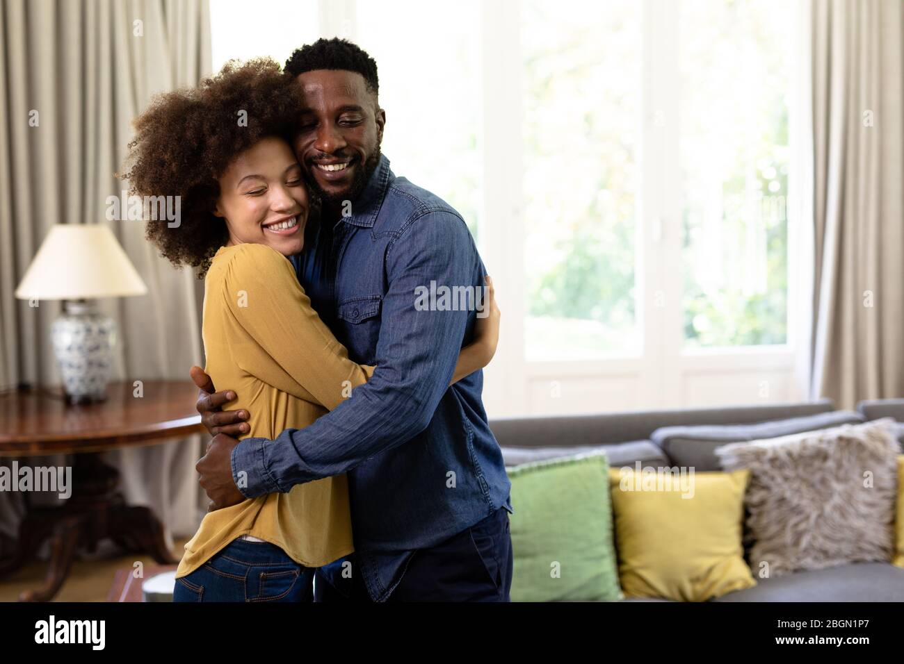 Mixed race couple enjoying their time at home Stock Photo