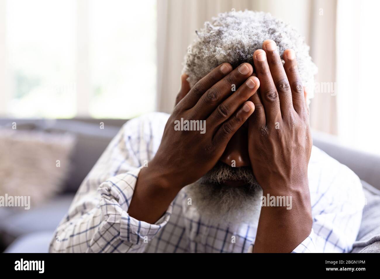 Portrait of a senior African American man At home during coronavirus covid19 pandemic Stock Photo