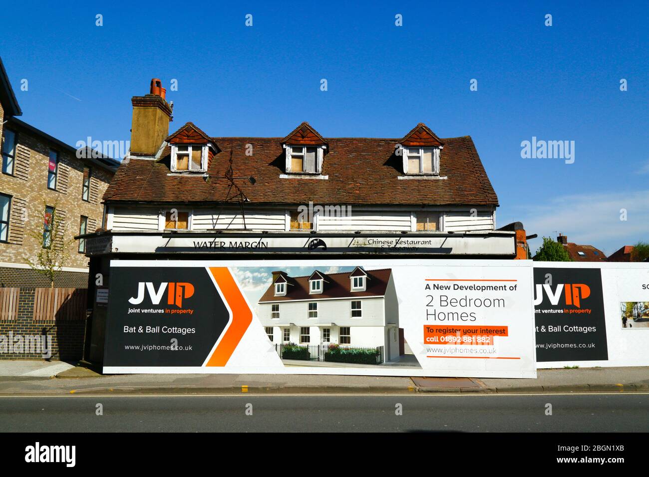 Signs outside project to convert the former Bat and Ball pub into cottages, Southborough, Kent, England Stock Photo