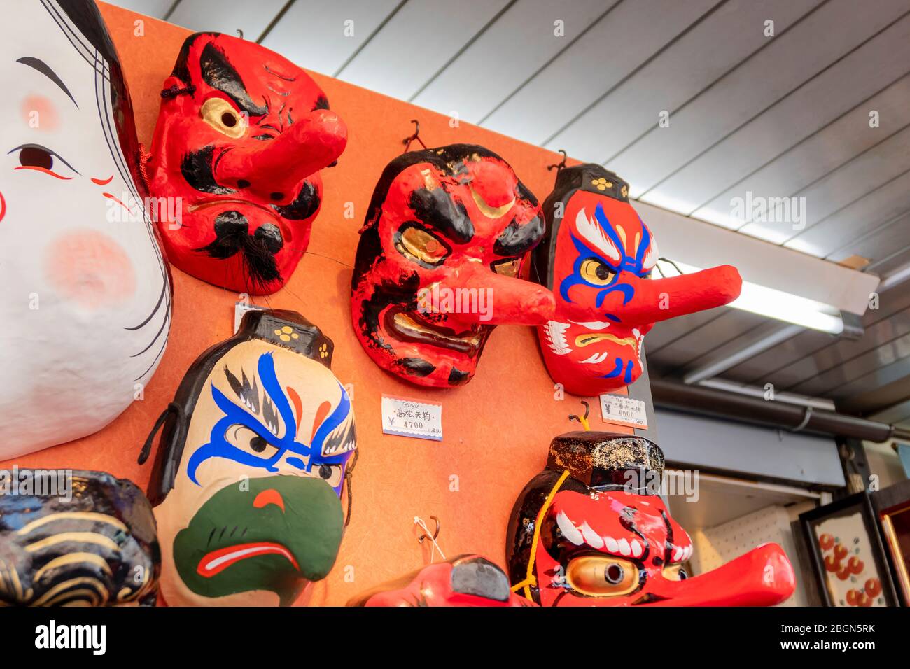 The many styles of traditional japanese masks for sell to be a souvenir in a shop at Asakusa temple Tokyo, Japan February 7,2020 Stock Photo