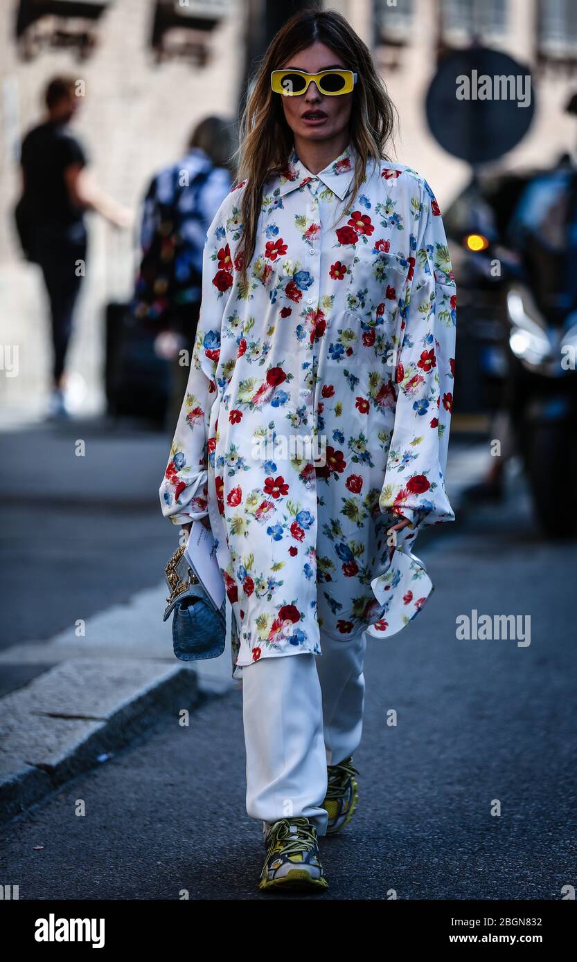 MILAN, ITALY - SEPTEMBER 21, 2019: Woman with Louis Vuitton jacket and dress  before Giorgio Armani fashion show, Milan Fashion Week street style Stock  Photo - Alamy