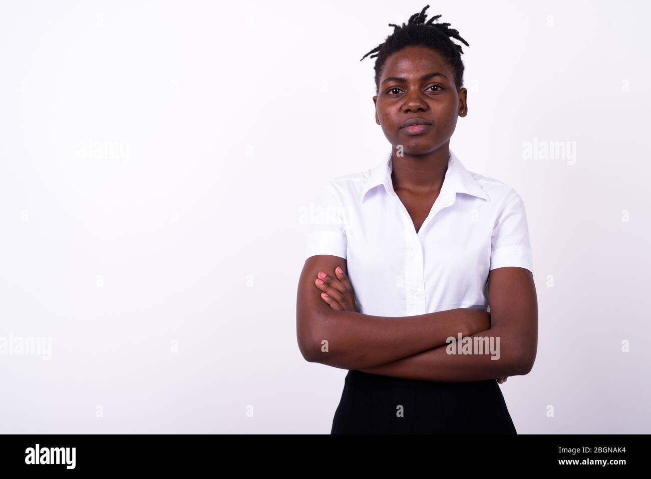 Portrait of young beautiful African woman as student Stock Photo