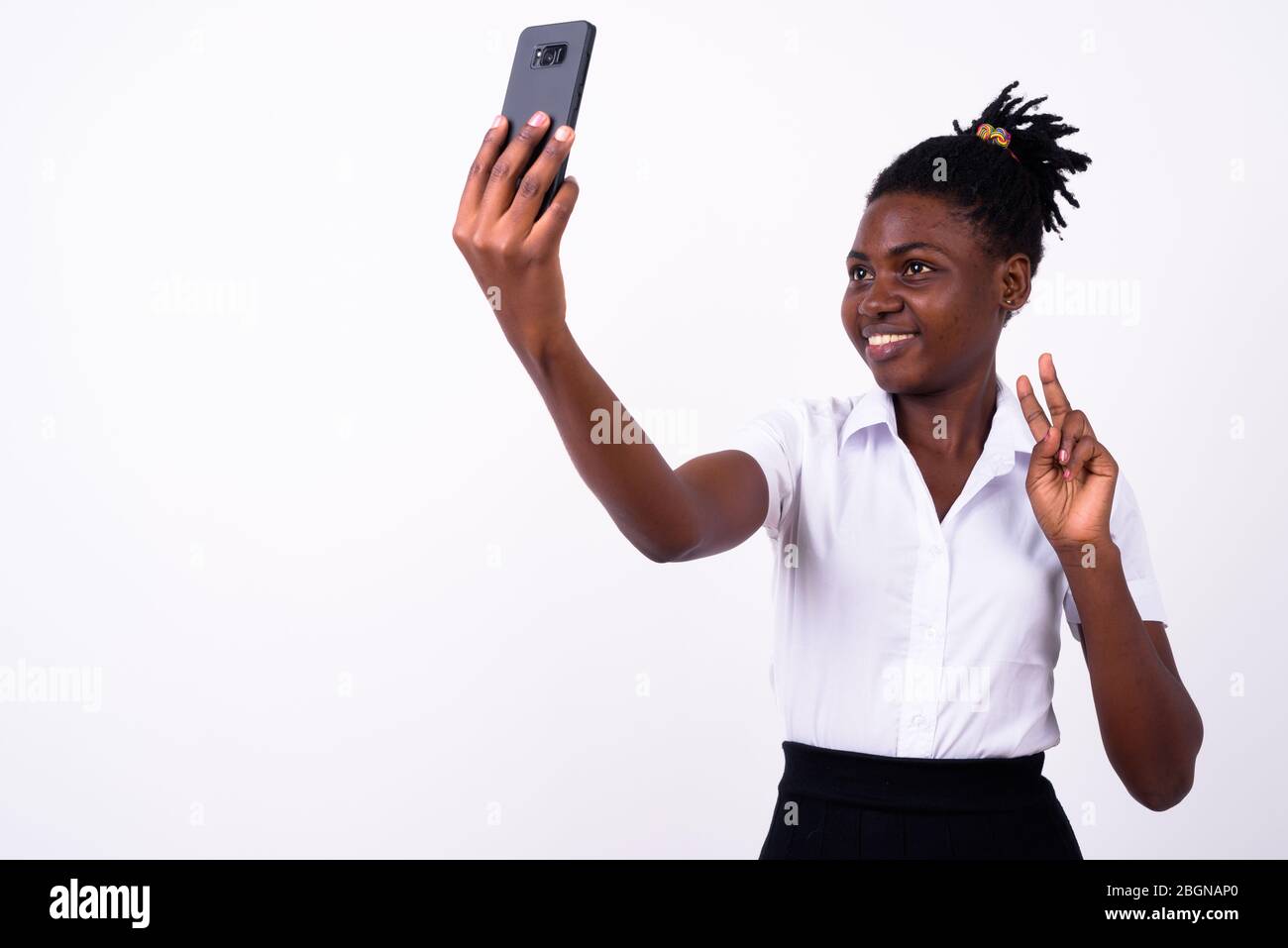Portrait of young beautiful African woman as student Stock Photo