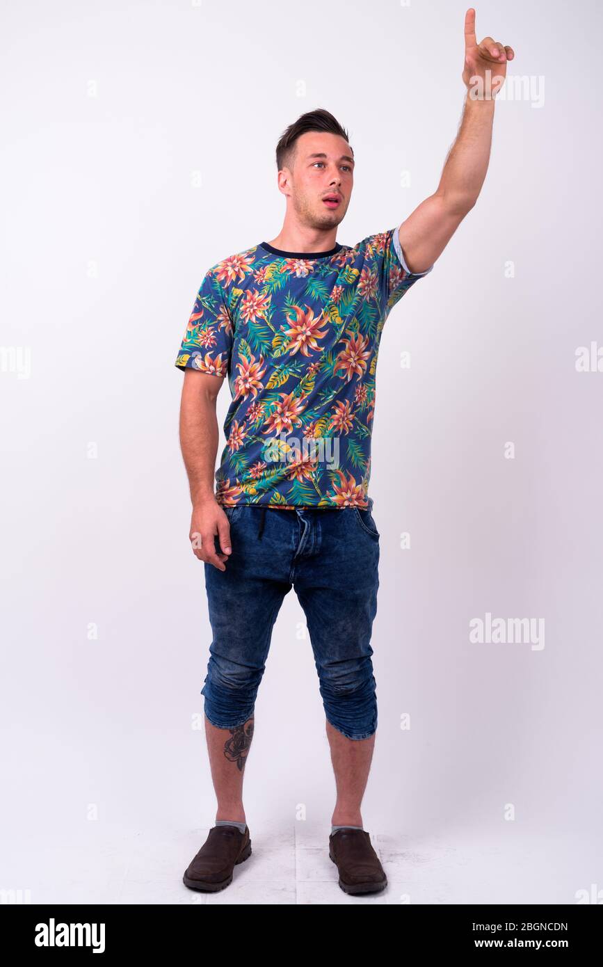 Full body shot of young handsome tourist man Stock Photo - Alamy