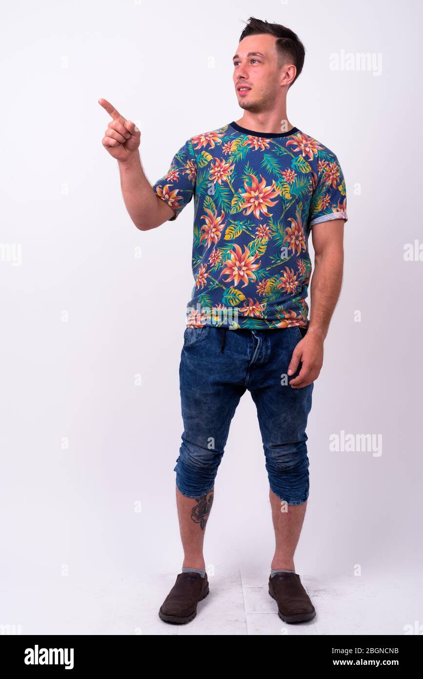 Full body shot of young handsome tourist man Stock Photo - Alamy