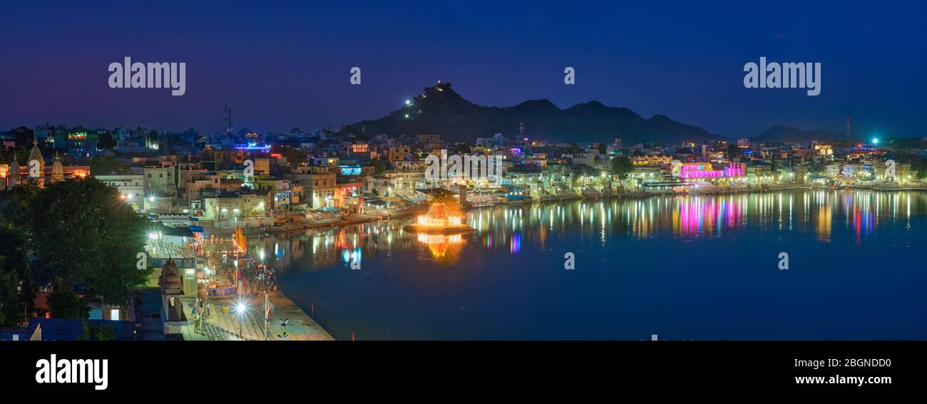 View of famous indian sacred holy city Pushkar with Pushkar ghats. Rajasthan, India. Horizontal pan Stock Photo