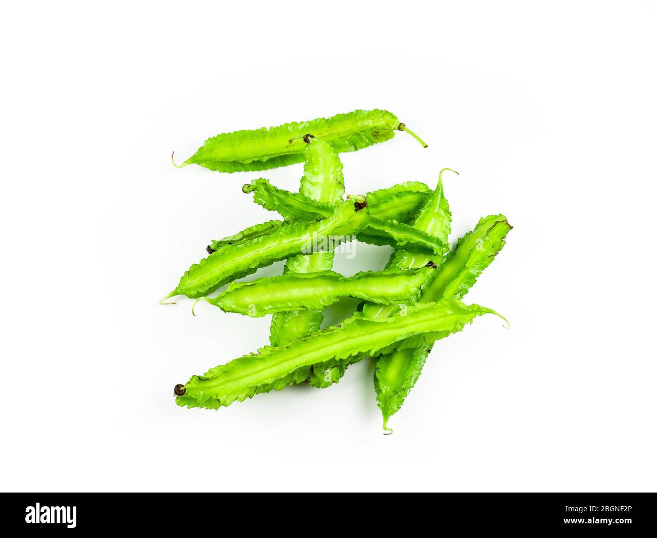 Winged beans on white background isolate. Vegetables to eat with chili