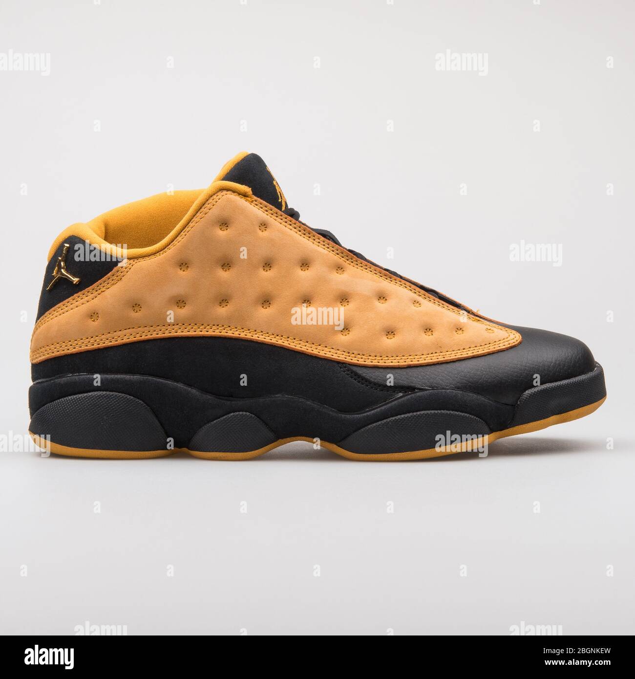 VIENNA, AUSTRIA - AUGUST 2, 2017: Nike Air Jordan 13 Retro Low black and  orange sneaker on white background Stock Photo - Alamy