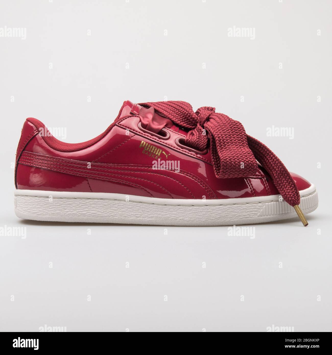 Red sneakers hi-res photography and - Alamy