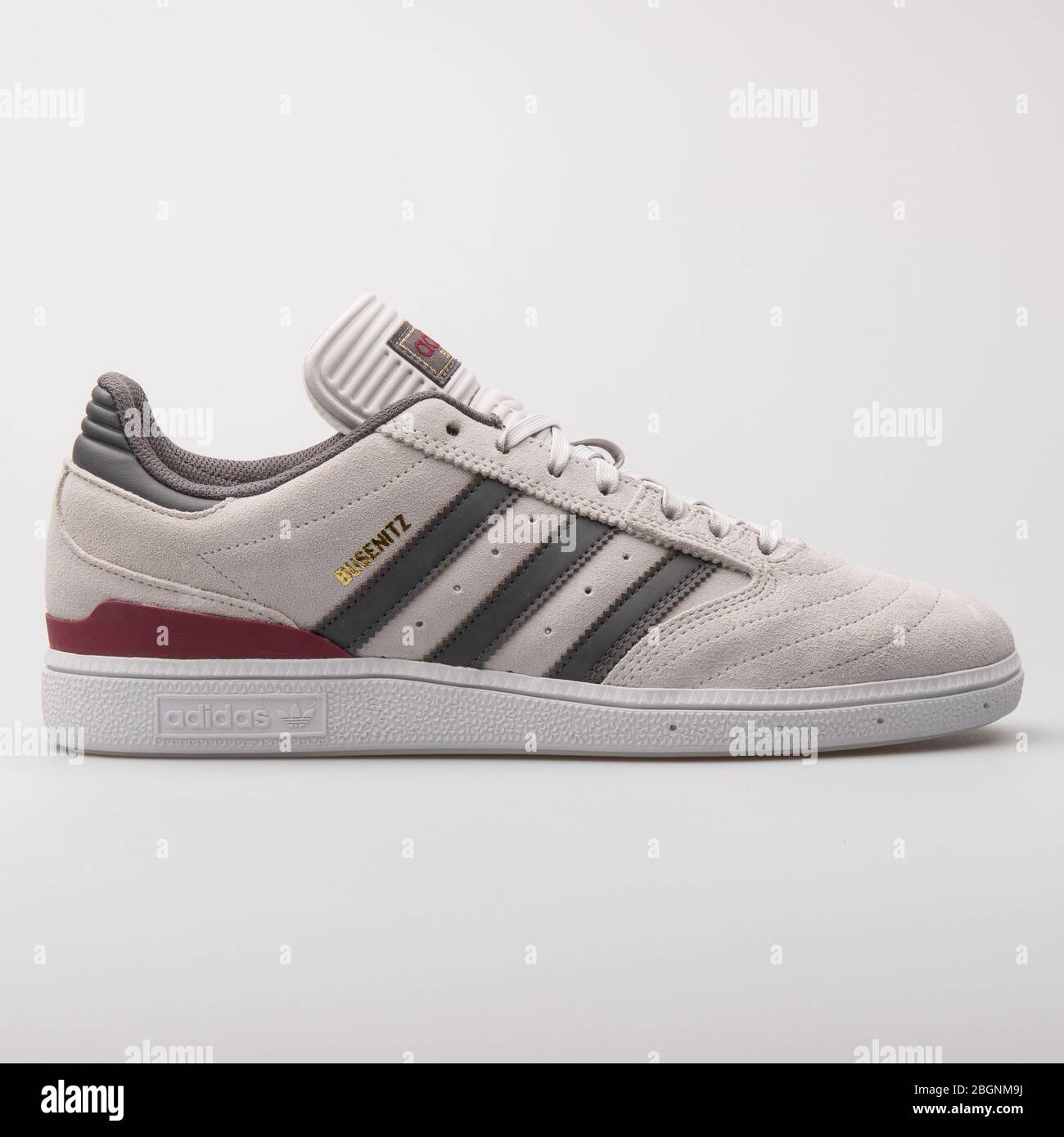 VIENNA, AUSTRIA - AUGUST 6, 2017: Adidas Busenitz beige, grey and burgundy  sneaker on white background Stock Photo - Alamy