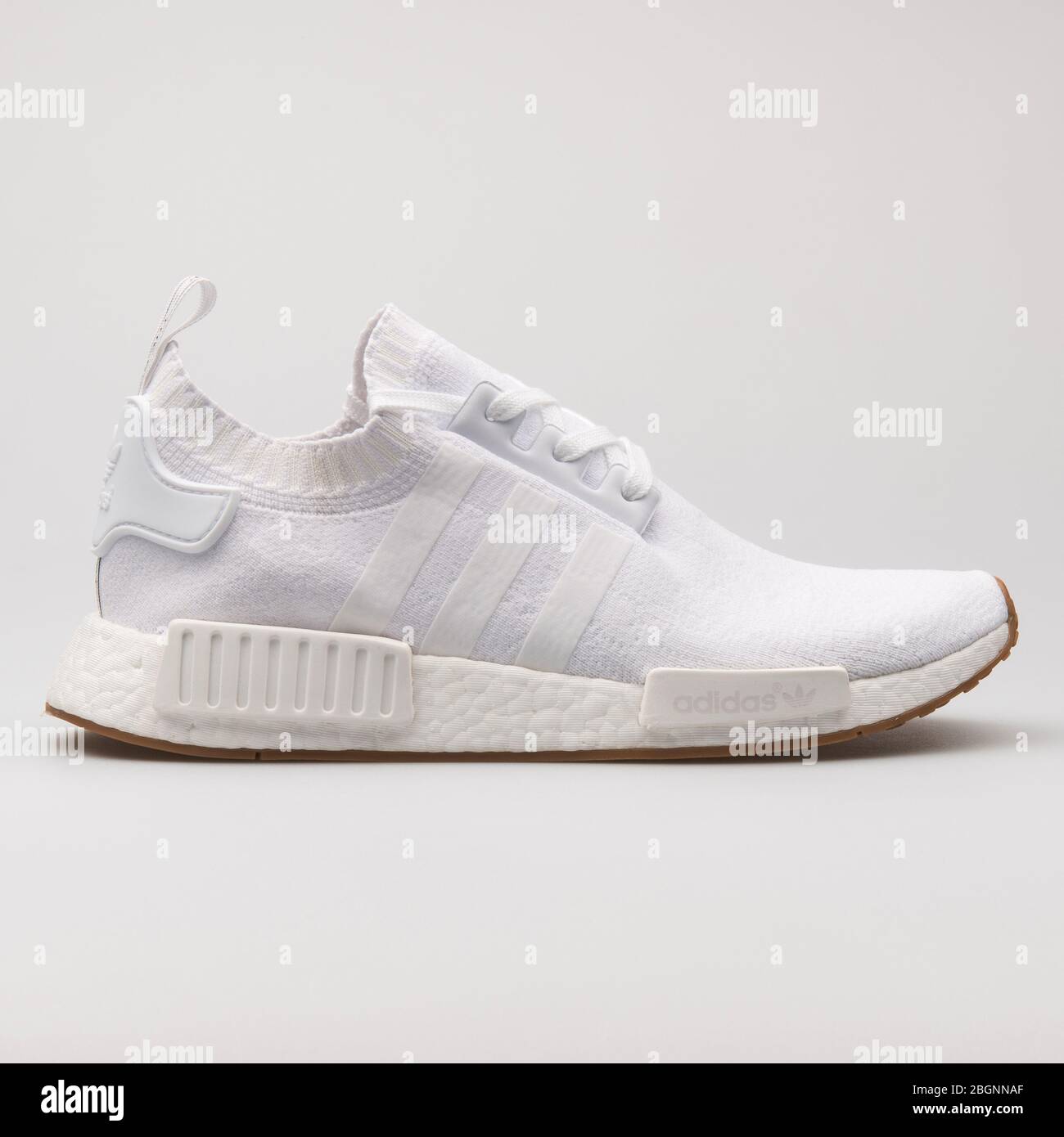 VIENNA, AUSTRIA - AUGUST 16, 2017: Adidas NMD R1 PK white sneaker on white  background Stock Photo - Alamy