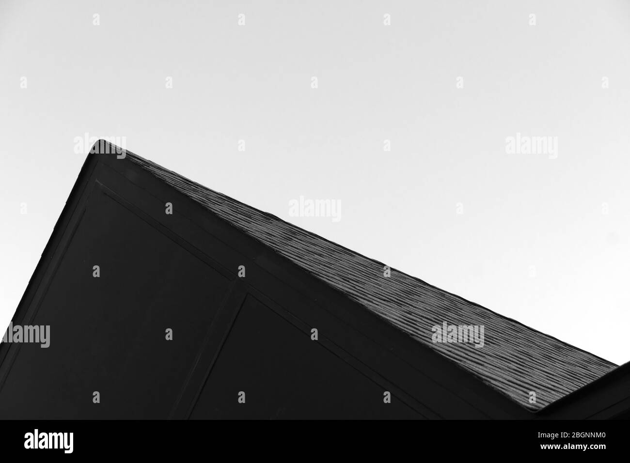 abstract black roof of modern house geometric architecture in black and white background Stock Photo