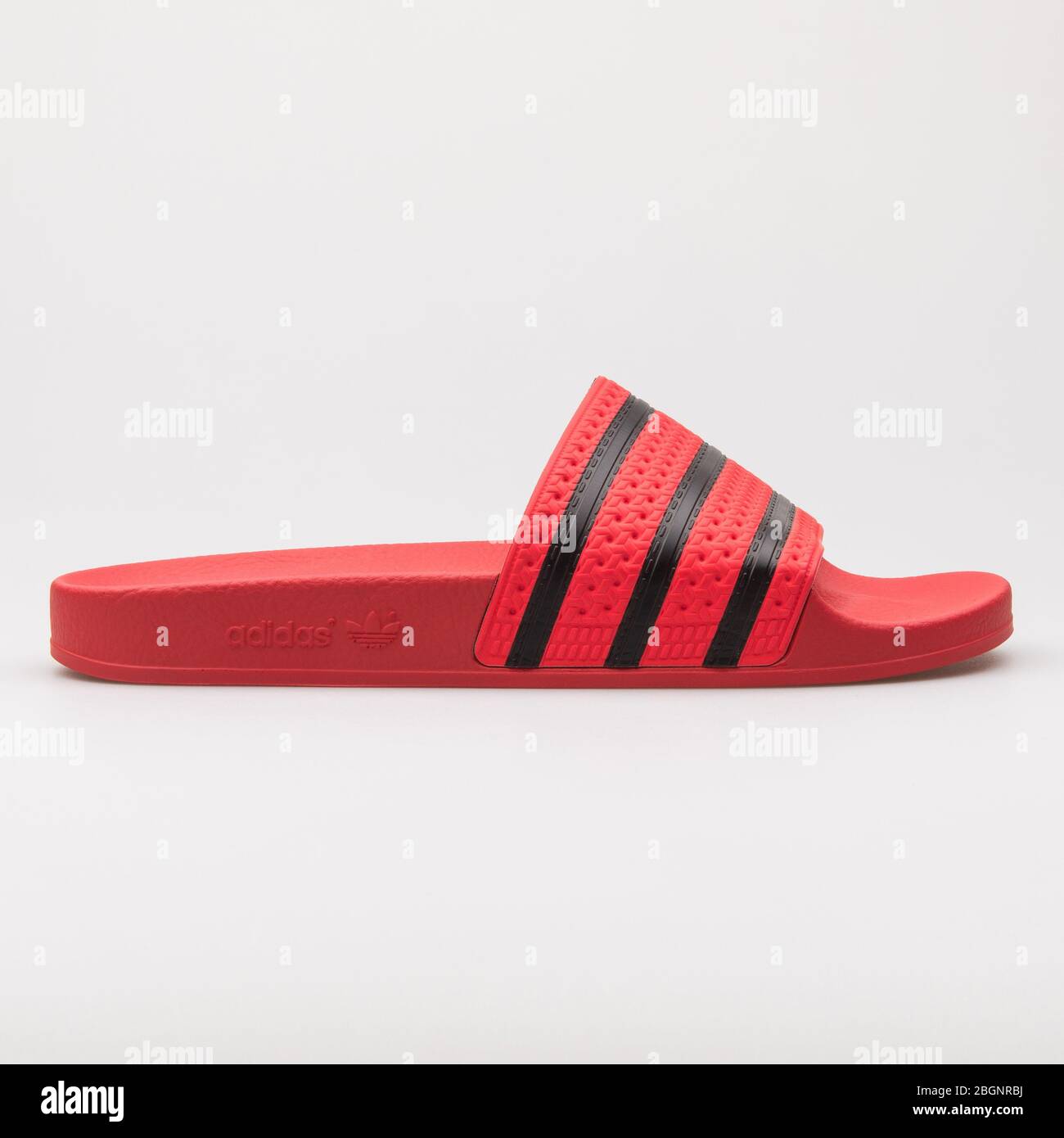 VIENNA, AUSTRIA - AUGUST 24, 2017: Adidas Aqua Slides red and black sandals  on white background Stock Photo - Alamy