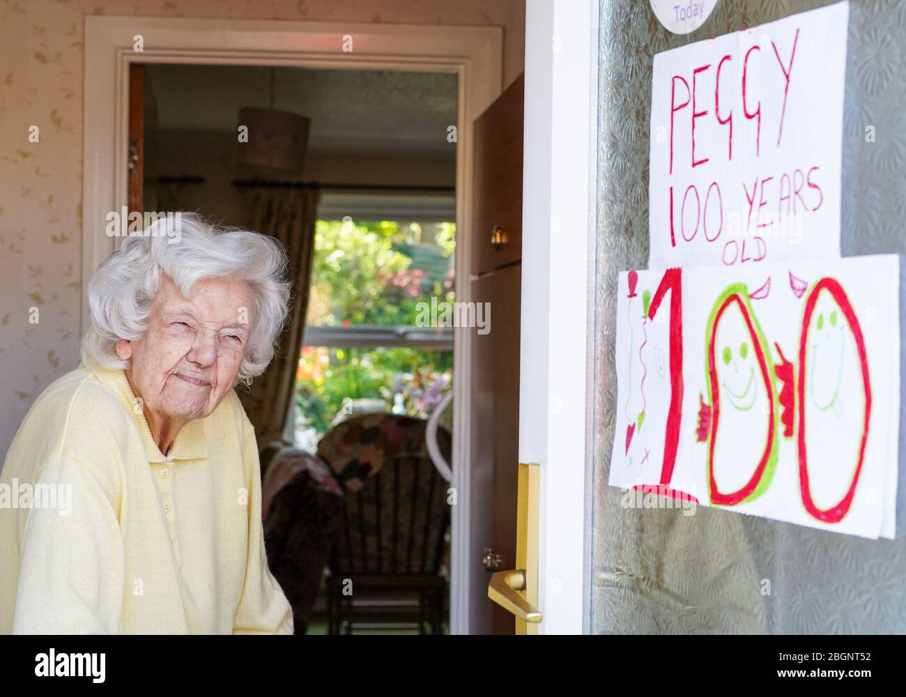 Kidderminster, UK. 22nd April, 2020. Pensioner Peggy Lappage reaches the fabulous 100 years young mark today! Celebrations had been planned, but due to the government's 'Stay home, Protect the NHS, Save lives' lockdown instruction, all get-togethers have had to be postponed. Although in isolation, well wishes have kept her telephone line hot all morning and later today at 5 o'clock all her kind neighbours will be surprising Peggy and coming out onto the street to collectively sing 'Happy Birthday' in her honour. Credit: Lee Hudson/Alamy Live News Stock Photo
