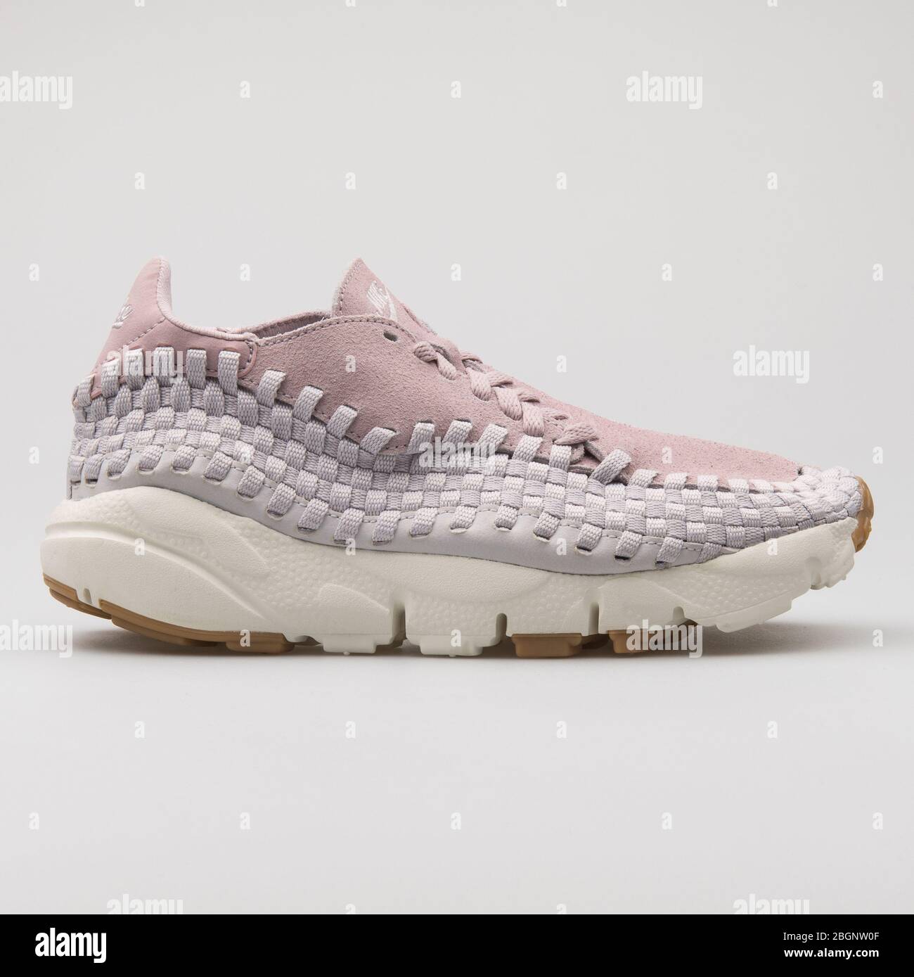 VIENNA, AUSTRIA - AUGUST 29, 2017: Nike Air Footscape Woven Chukka suede  rose sneaker on white background Stock Photo - Alamy