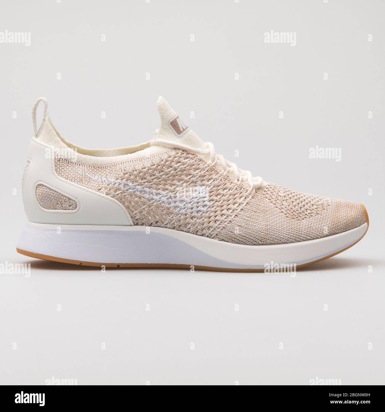 VIENNA, AUSTRIA - AUGUST 29, 2017: Nike Air Zoom Mariah Flyknit Racer beige  and white sneaker on white background Stock Photo - Alamy