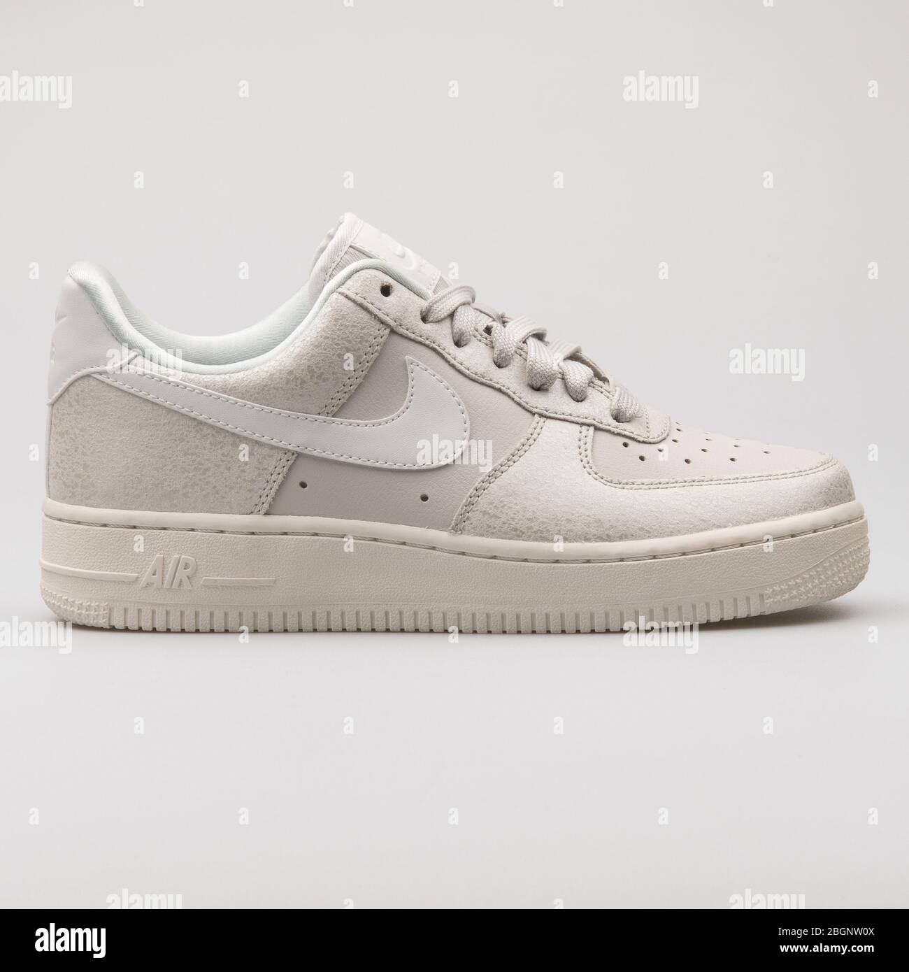 VIENNA, AUSTRIA - AUGUST 29, 2017: Nike Air Force 1 beige sneaker on white  background Stock Photo - Alamy