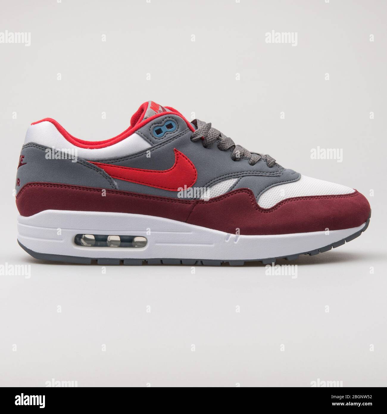 VIENNA, AUSTRIA - AUGUST 29, 2017: Nike Air Max 1 Premium white, grey, red  and burgundy sneaker on white background Stock Photo - Alamy