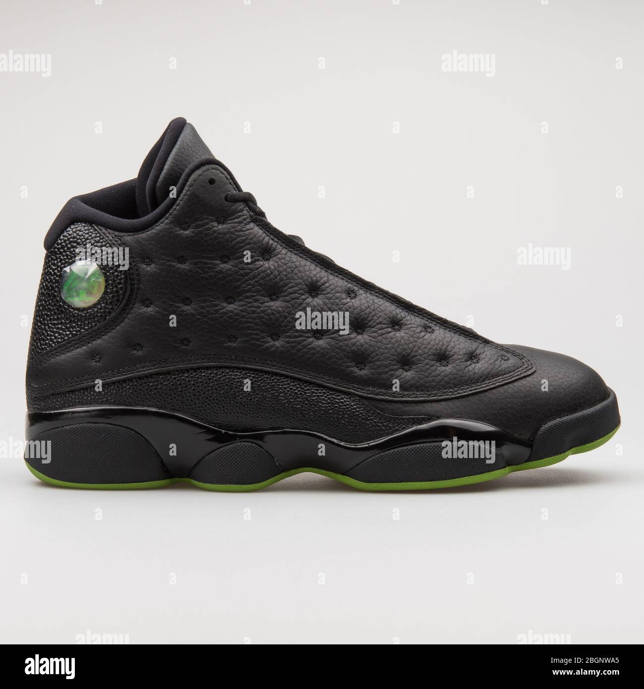 VIENNA, AUSTRIA - AUGUST 29, 2017: Nike Air Jordan 13 Retro black and green  sneaker on white background Stock Photo - Alamy