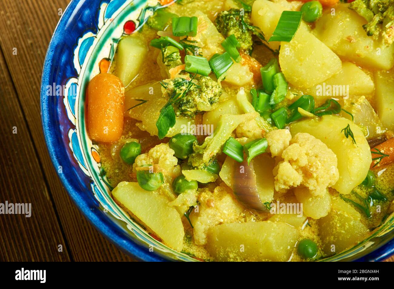 Creamy Coconut veggie korma, mixed vegetable curry Stock Photo Alamy
