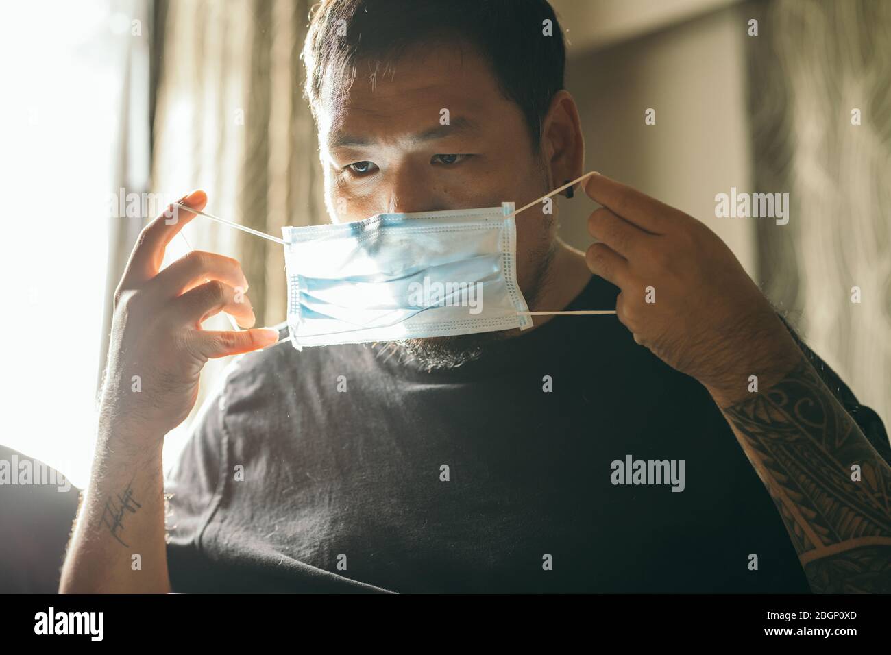 Asian man wear protective hi-res stock photography and images - Alamy
